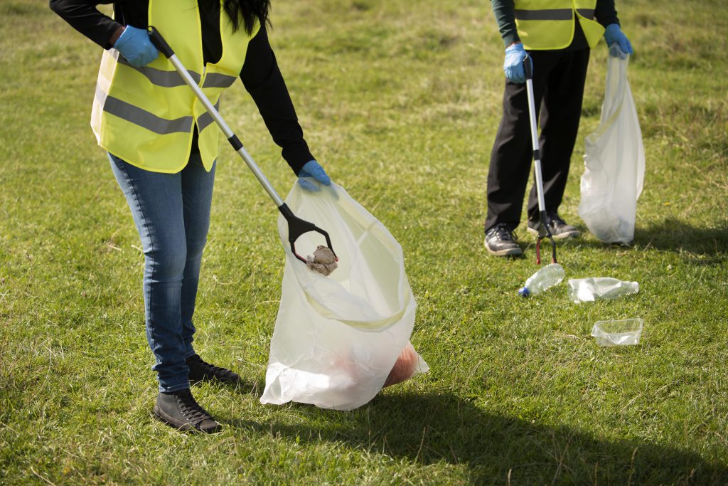 people-doing-community-service-by-collecting-trash